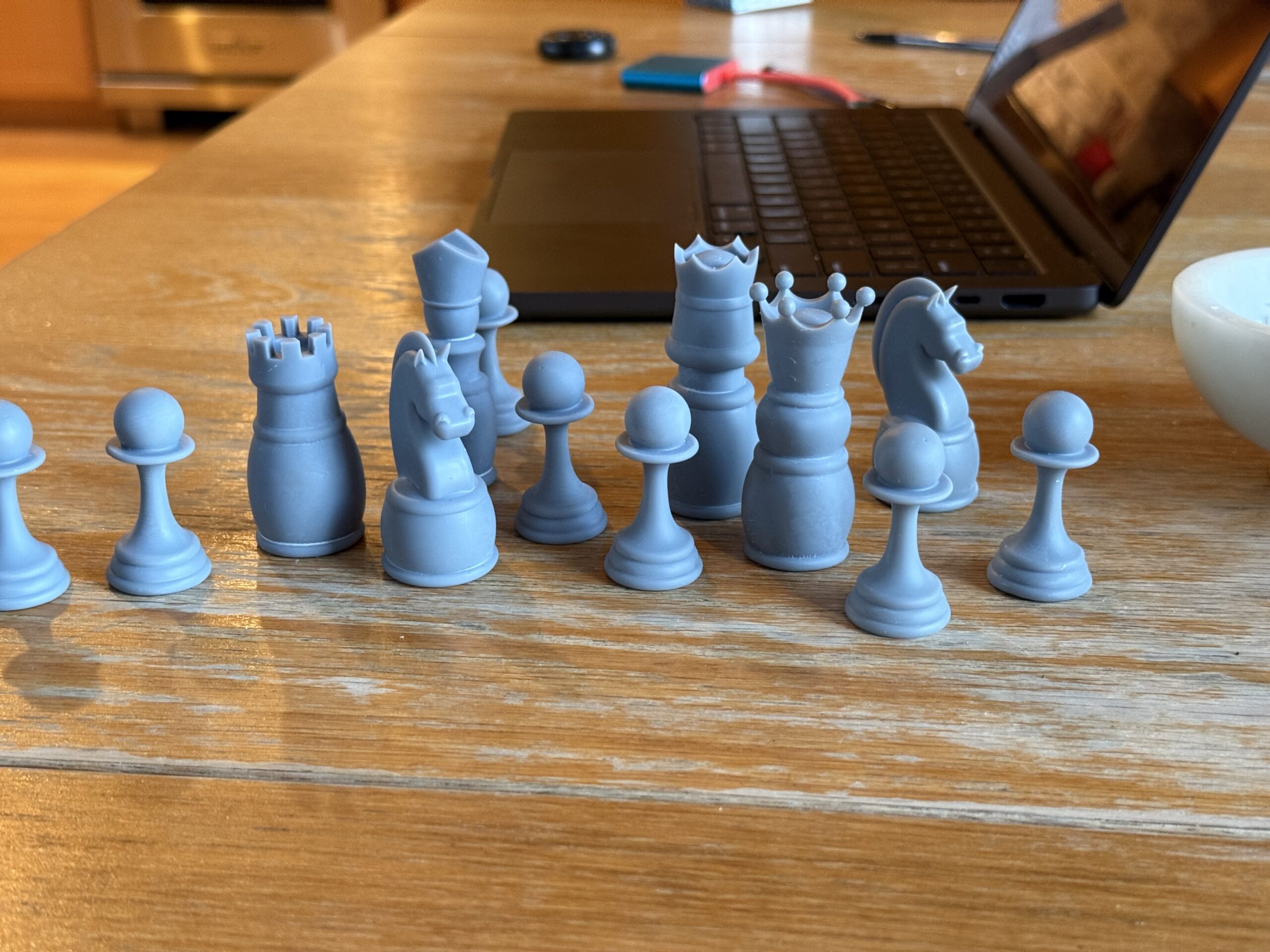 First test prints of chess pieces in gray resin