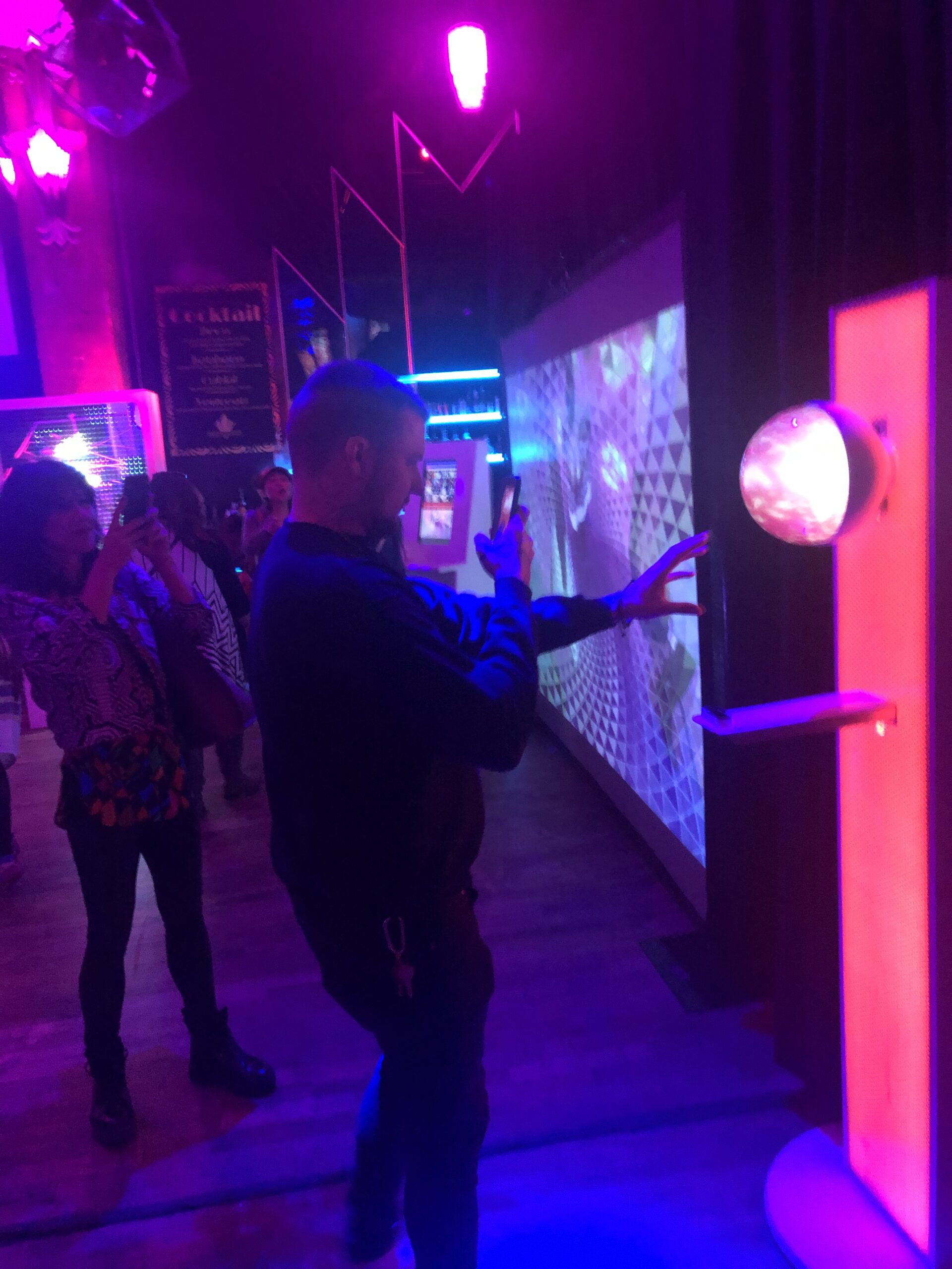 Participant interacting with The Orb using hand gestures