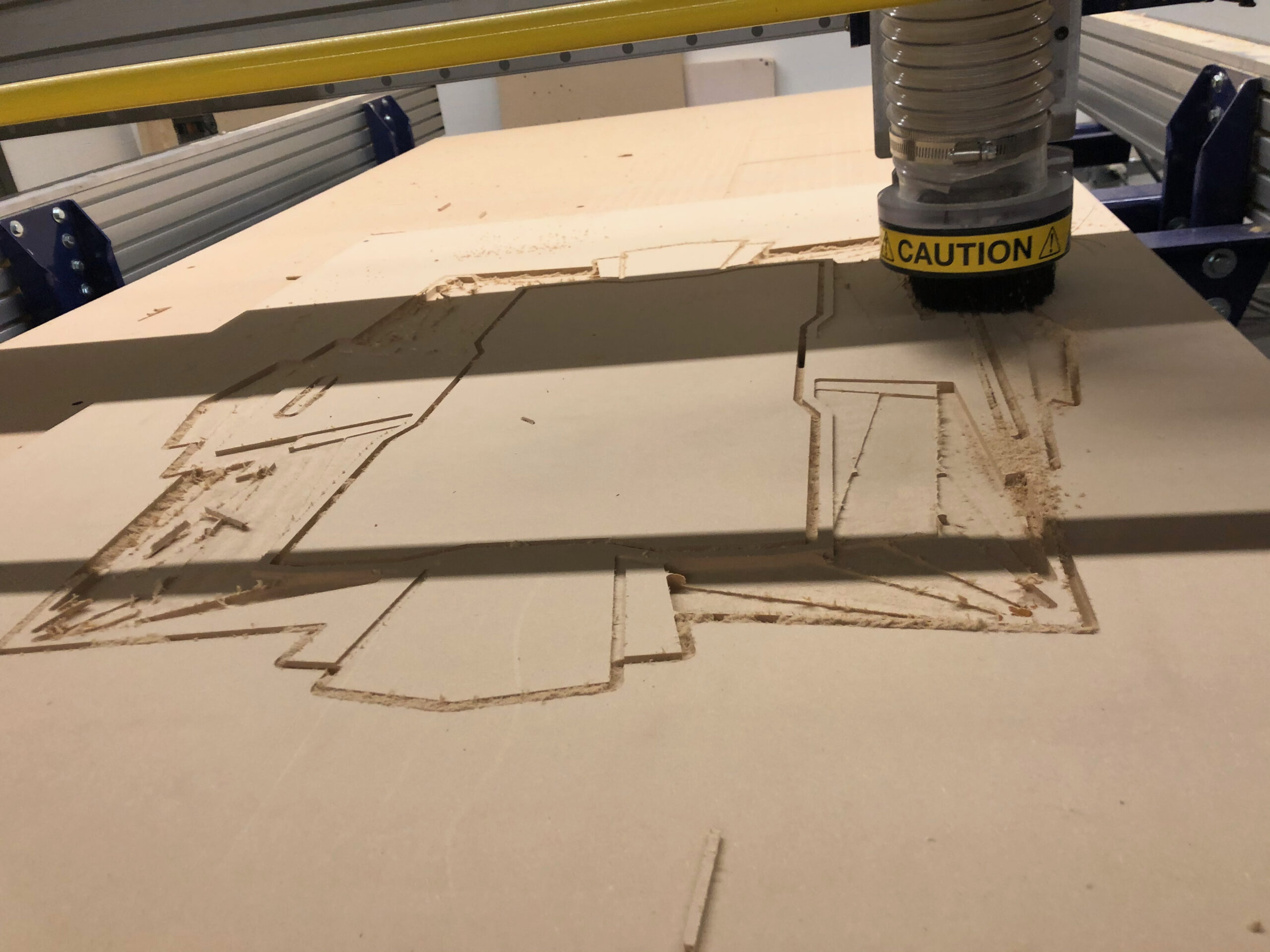 CNC machine cutting Art Deco facade pieces from MDF