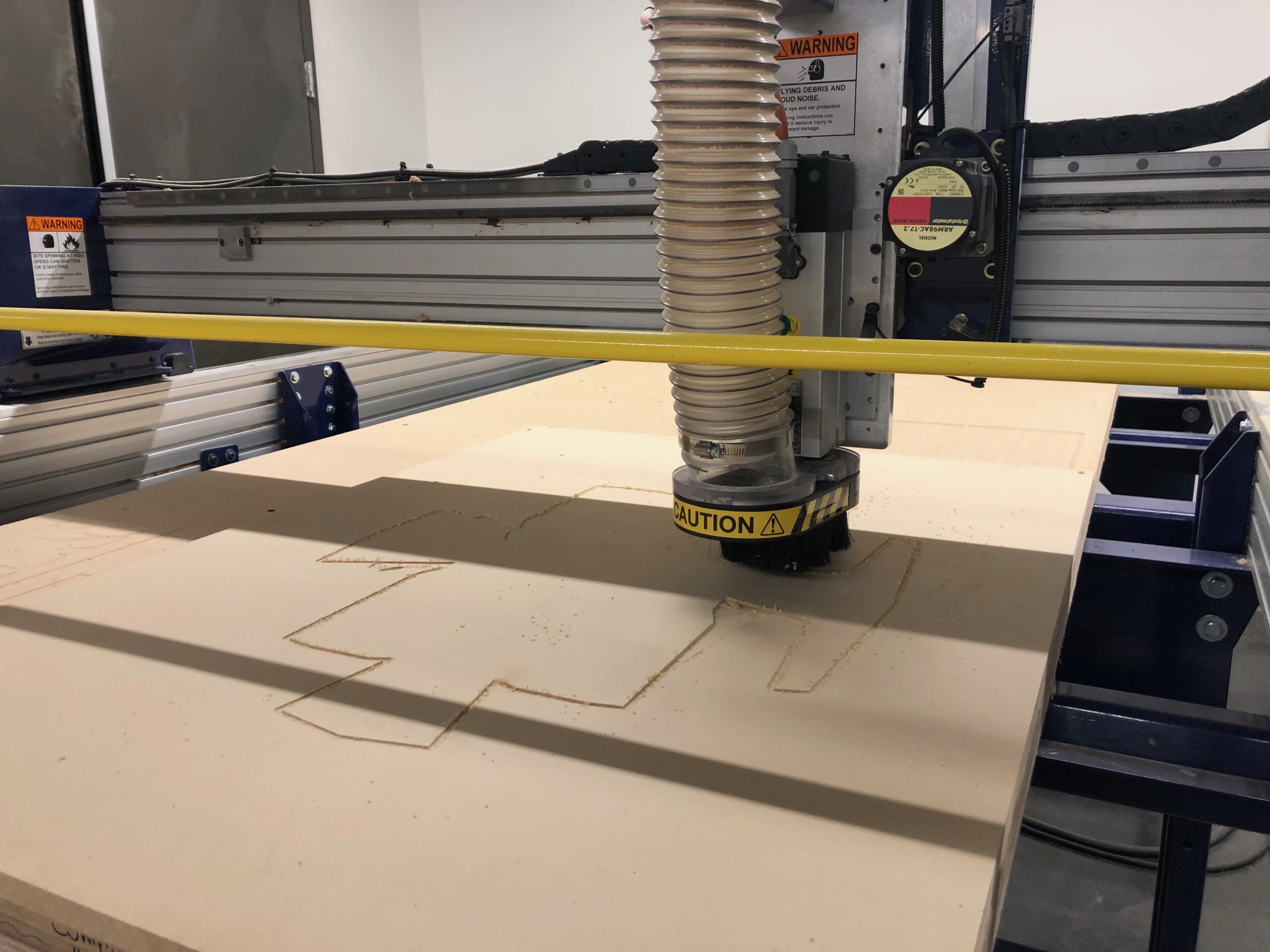 CNC machine routing MDF for the facade